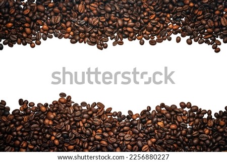 Large group of roasted coffee beans isolated on white background with copy space. Horizontal composition.