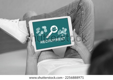 Woman looking at recruitment concept on a tablet