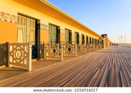 The famous beach cabins of the promenade des Planches in Deauville. Normandy, France. Royalty-Free Stock Photo #2256916017