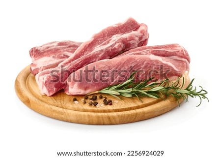 Pork fillet tenderloin with rosemary, raw meat, close-up, isolated on white background Royalty-Free Stock Photo #2256924029