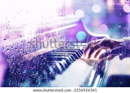 Piano behind the window with water drops on a rainy day. Relax music and sad piano for travel road.