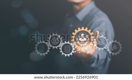 HRM or Human Resource Management ,Strategic planning for success through people business development concept by choosing professional leaders employee competency Teamwork, icons on human hands Royalty-Free Stock Photo #2256926901