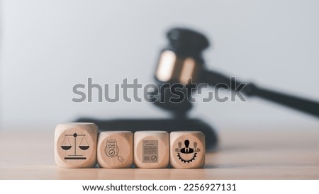 wooden blocks laying on the table,law legal services advice and inspection,legal and justice concepts,document approval,legal Document Icon,labor law,law and defense.