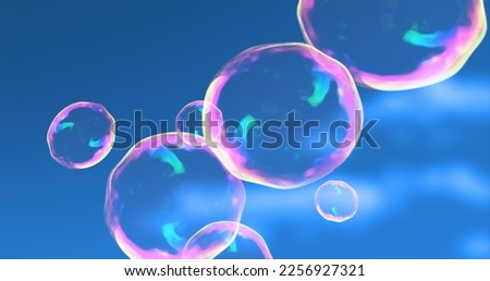 Abstract transparent soap bubbles flying up bright iridescent beautiful festive against the blue sky. Abstract background.