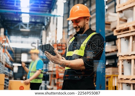 Warehouse worker managing logistics and goods transportation to the market. Man walking  and using tablet to control distribution.in warehouse concept.  virtual icon diagram

