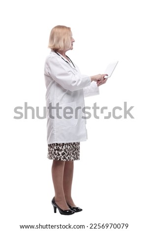 in full growth. medical woman with a digital tablet.