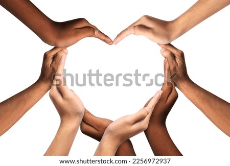 Unity and diversity are at the heart of a diverse group of people connected together as a supportive symbol that represents a sense of teamwork and togetherness. Symbol and shape created from hands.