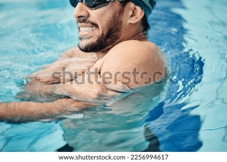 Man in swimming pool, athlete with injury and shoulder pain, fitness with sport accident and muscle ache during workout. Water sports, stroke mistake and swimmer, exercise and problem with arm