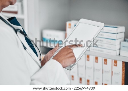Mockup, digital tablet and hands of pharmacy for medicine, stock and checklist, prescription or pills. Copy space, screen and female health expert online for internet, search and app for inventory Royalty-Free Stock Photo #2256994939