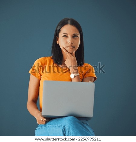 Thinking, laptop and woman in studio with emoji, gesture and contemplating against grey background. Idea, girl and contemplation while online for advertising, mockup and space while posing isolated