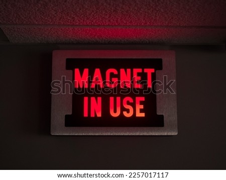 MRI magnet in use sign, red, warning sign