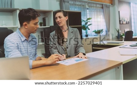 business caucasian and asian person interview. human resource making decision about disrespectful recruitment employee worker. caucasian boss decide not to recruit new candidate from disrespectful. Royalty-Free Stock Photo #2257029401