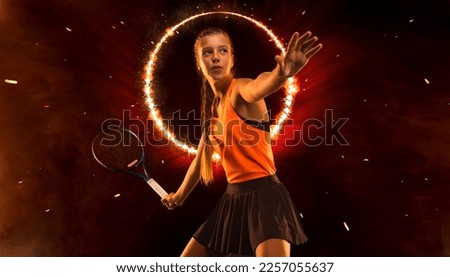 Tennis player. High-resolution photography for advertising the tennis academy and school. Girl athlete teenager with racket. Sport concept.