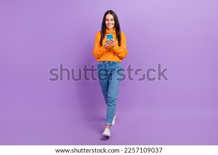 Full size photo of millennial lady have walk using modern technology search shopping sale isolated purple color background