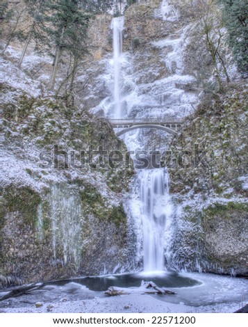 A panoramic view of Multnomah Falls frozen in winter