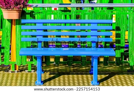 typical old wooden bench - parkbench - photo Royalty-Free Stock Photo #2257154153