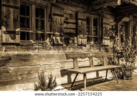 typical old wooden bench - parkbench - photo Royalty-Free Stock Photo #2257154225