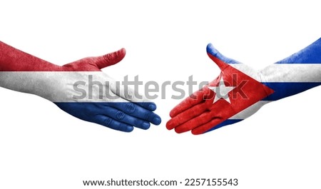 Handshake between Cuba and Netherlands flags painted on hands, isolated transparent image.