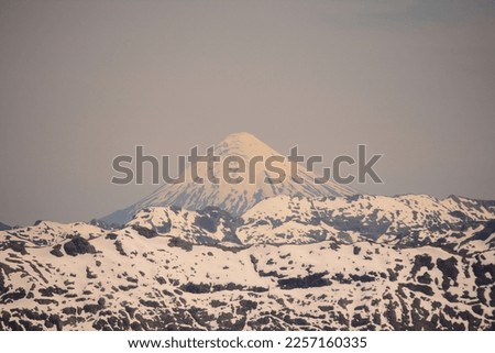view of the villarrica volcano in chile. snowy volcano in chilean patagonia