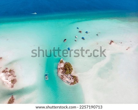 Aerial Drone Shot of the Pirate Channel of Bacalar Quintana roo, Mexico. Shipwreck island in Lagoon of seven colors Royalty-Free Stock Photo #2257190713