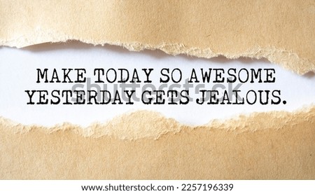Make Today So Awesome Yesterday Gets Jealous. Words written under torn paper. Motivation concept text.