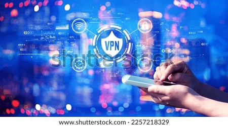 VPN concept with person using a smartphone in a city at night