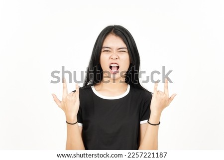 Showing Metal Hands Of Beautiful Asian Woman Isolated On White Background