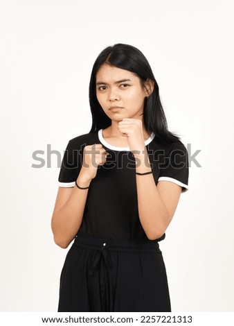 Punching fist to fight or angry Of Beautiful Asian Woman Isolated On White Background Royalty-Free Stock Photo #2257221313
