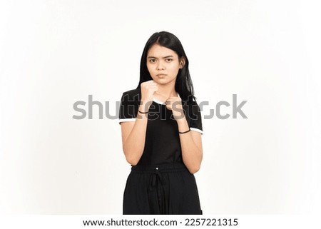 Punching fist to fight or angry Of Beautiful Asian Woman Isolated On White Background Royalty-Free Stock Photo #2257221315