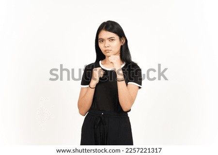 Punching fist to fight or angry Of Beautiful Asian Woman Isolated On White Background Royalty-Free Stock Photo #2257221317