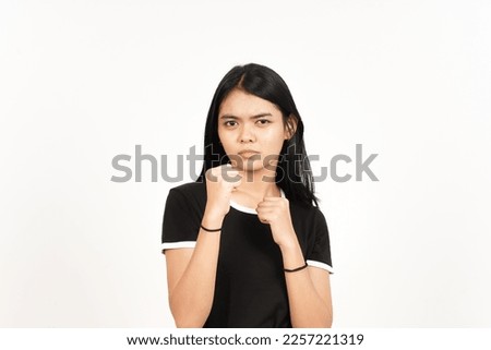 Punching fist to fight or angry Of Beautiful Asian Woman Isolated On White Background Royalty-Free Stock Photo #2257221319