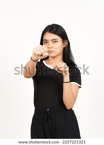 Punching fist to fight or angry Of Beautiful Asian Woman Isolated On White Background Royalty-Free Stock Photo #2257221321