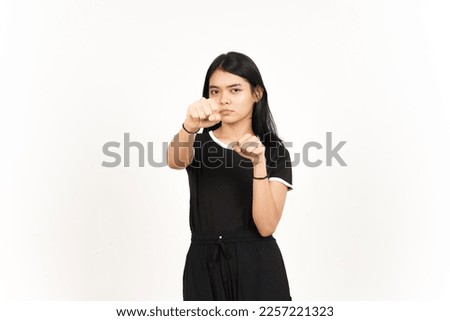 Punching fist to fight or angry Of Beautiful Asian Woman Isolated On White Background Royalty-Free Stock Photo #2257221323