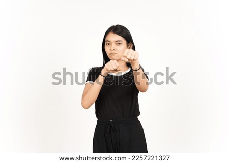 Punching fist to fight or angry Of Beautiful Asian Woman Isolated On White Background Royalty-Free Stock Photo #2257221327