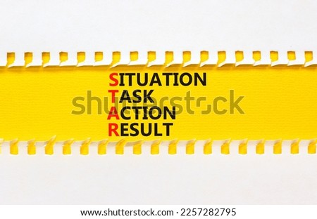 STAR situation task action result symbol. Concept words STAR situation task action result on yellow paper on beautiful white background. Business STAR situation task action result concept. Copy space