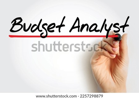 Budget Analyst are responsible for reviewing the organization's budget and approving spending requests, text concept background Royalty-Free Stock Photo #2257298879