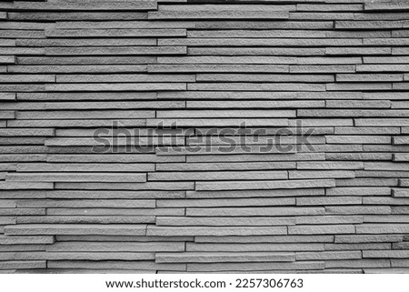 seamless cladding natural gray stone wall, for background or texture