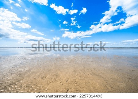 North Sea beach in Sankt Peter Ording, Germany Royalty-Free Stock Photo #2257314493