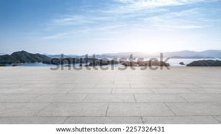 Road surface and garden lake Royalty-Free Stock Photo #2257326431