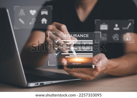 Sign insurance form agreements concept, Businessman signs insurance contracts  e-signing digital online, document management, concerning mortgage loan offer for and house insurance