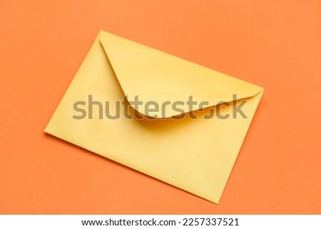 Yellow envelope on color background