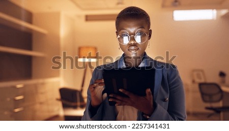 Tablet, night reading business woman with glasses for social media marketing, digital analytics or website review in office. Manager, entrepreneur or black woman check online international b2b email