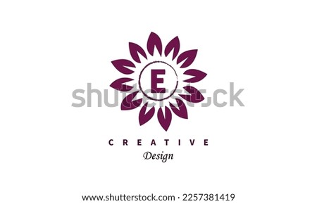 Letter E logo at colorful flower logo design. Vector element for posters, t-shirts and cards.