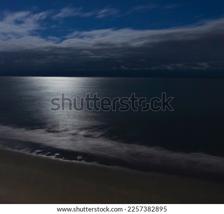 Atlantic Ocean that is reflecting the moon at Myrtle Beach