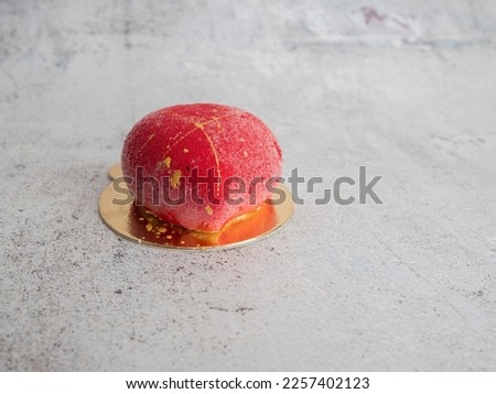 red velvet sprayed sweet cookie heart shaped stuffed with caramenl with golden brush strokes Royalty-Free Stock Photo #2257402123