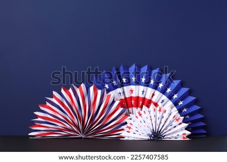 4th of July or President's Day banner mockup. USA paper fans on blue background
