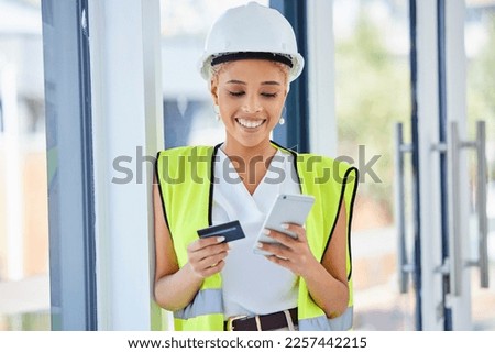 Construction worker, woman and ecommerce with credit card and smartphone, happy with payment and bank. Internet, banking and online shopping with contractor, stock purchase with retail and mobile app