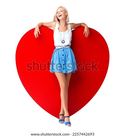 Red, heart and woman in studio with poster, billboard or paper for love, valentines day or message on white background. Happy, girl or model relax on icon, board or emoji, peace and hope or isolated