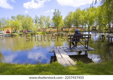 Wooden pier on the river in sunny day in Vylkove, Ukraine
