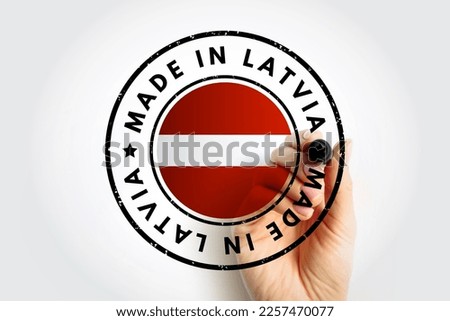 Made in Latvia text emblem badge, concept background